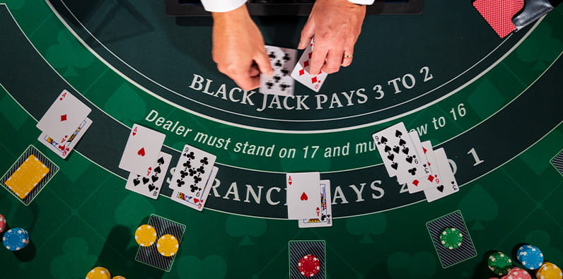 Dealer deals cards in blackjack 21